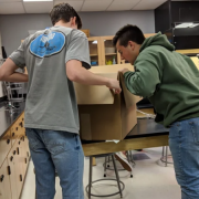 Students opening Box of tools to Study the Colorado River provided by the Student Research Foundation
